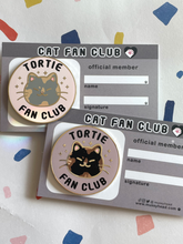 Load image into Gallery viewer, Tortie Fan Club Hard enamel pins